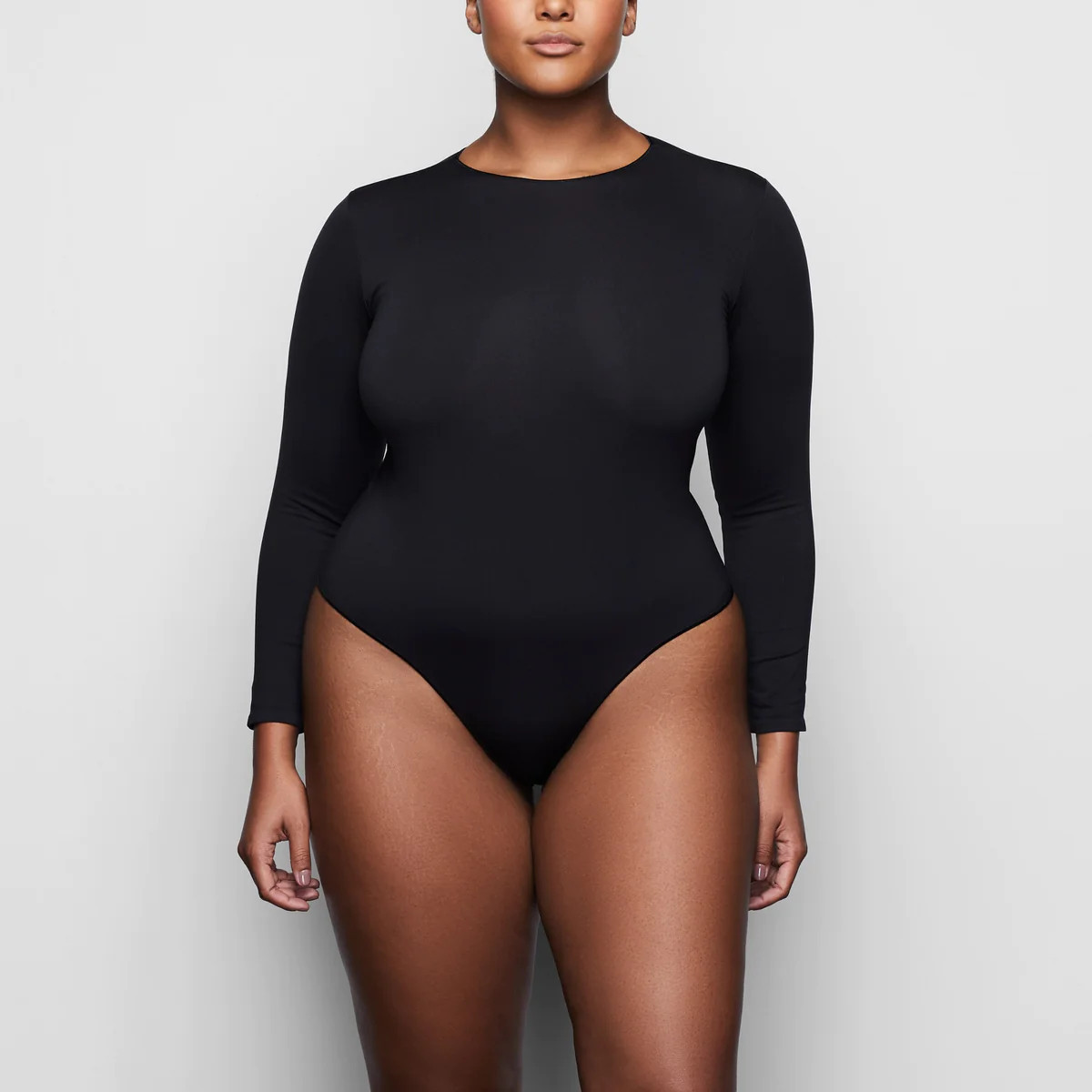 ESSENTIAL CREW NECK LONG SLEEVE BODYSUIT | SKIMS (US)