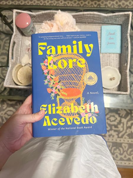 Book recommendation. Amazon finds. “Family Lore” by Elizabeth Acevedo. 

* synopsis *

“ Flor has a gift: she can predict, to the day, when someone will die. So when she decides she wants a living wake—a party to bring her family and community together to celebrate the long life she’s led—her sisters are surprised. Has Flor foreseen her own death, or someone else’s? Does she have other motives? She refuses to tell her sisters, Matilde, Pastora, and Camila.

But Flor isn’t the only person with secrets: her sisters are hiding things, too. And the next generation, cousins Ona and Yadi, face tumult of their own.

Spanning the three days prior to the wake, Family Lore traces the lives of each of the Marte women, weaving together past and present, Santo Domingo and New York City. Told with Elizabeth Acevedo’s inimitable and incandescent voice, this is an indelible portrait of sisters and cousins, aunts and nieces—one family’s journey through their history, helping them better navigate all that is to come.”
.
.
.
… #books 

#LTKhome #LTKxPrime #LTKfindsunder50