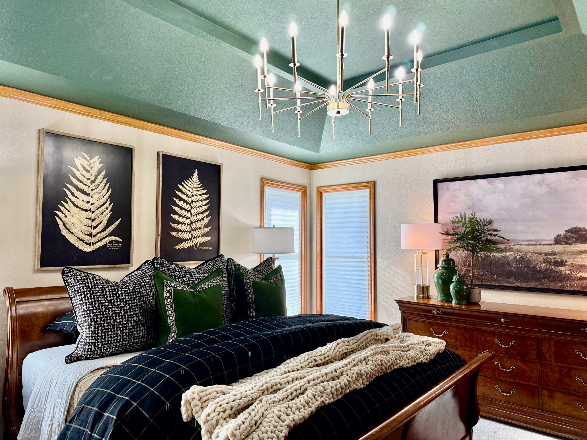 There’s something so inviting about a beautifully layered bed—it instantly makes a bedroom feel warm, cozy, and thoughtfully designed.

For this install, we focused on classic bedroom layering to create that designer feel. We started with crisp sheets, added a structured duvet, layered in oversized pillows for fullness, and finished it off with a soft knit throw for texture. The mix of rich greens, classic neutrals, and tailored patterns gives the bed depth while still feeling calm and elegant.

This is one of our favorite interior designer tricks for making a bedroom look polished: layering bedding with different textures, fabrics, and pillow sizes.

If you’ve been wanting your bedroom to feel more luxurious and cozy, we linked the bedding, pillows, and styling pieces from this look for you.

#bedroomdecor #layeredbedding #luxurybedroom #bedstyling #interiordesignideas #cozybedroom #ltkhome #ltkfinds #traditionalhome #classicdecor #bedroominspiration #designerbed #homeinteriorstyling 

#LTKHome