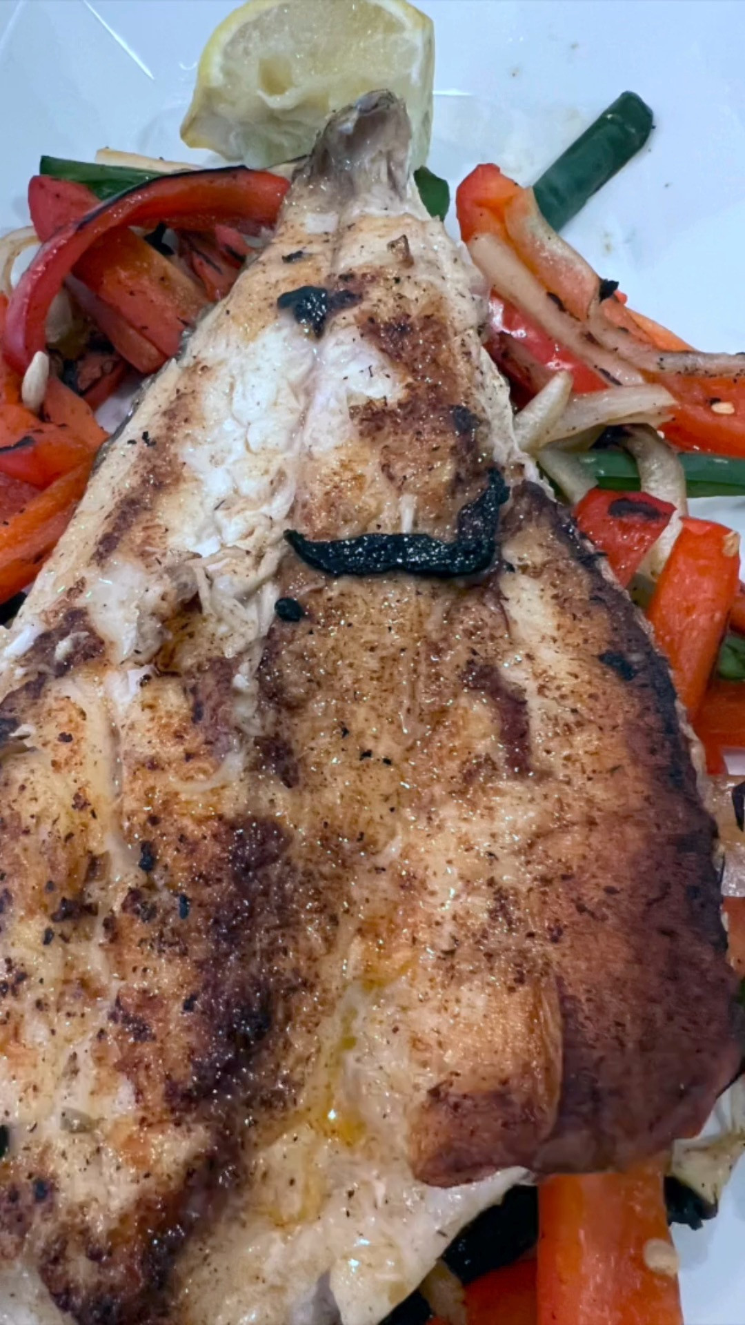 Got 15 minutes to make dinner?  You can make the most delectable creole fish with peppers & onions.  I happened to have a redfish that I brought back from the Mississippi Gulf Coast,, but any mild white fish 🐟(like tilapia) will do.  

Season it up with a premade Creole seasoning and saute some peppers🫑 & onions🧅 to serve the fish over.  Perfection! 🥰 

 #LTKHome #LTKFindsUnder100 #LTKFamily