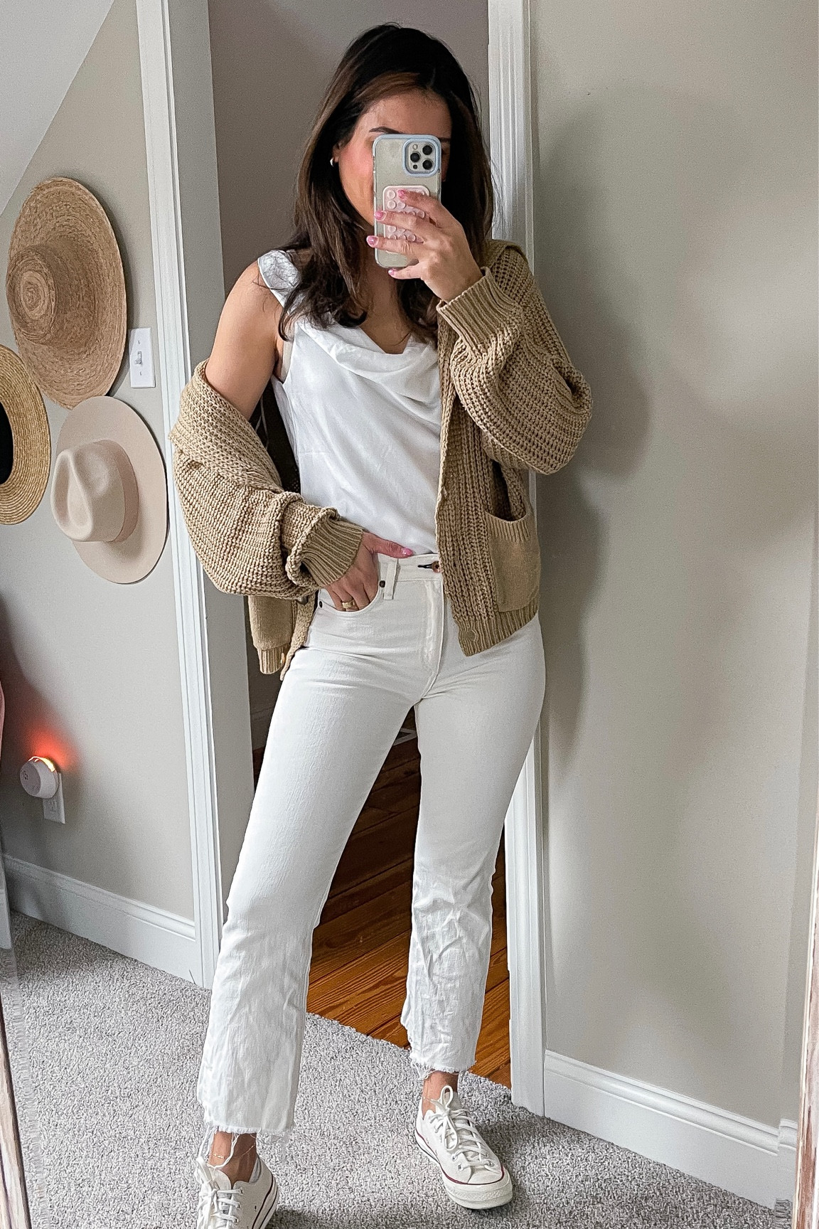 Petal and pup code MICHELLEQUINN for 20% off  Current favorite spring outfit idea with silky white top with tan cardigan sweater off white jeans and parchment converse sneakers. Spring outfit idea  

#LTKSeasonal #LTKunder50 #LTKunder100