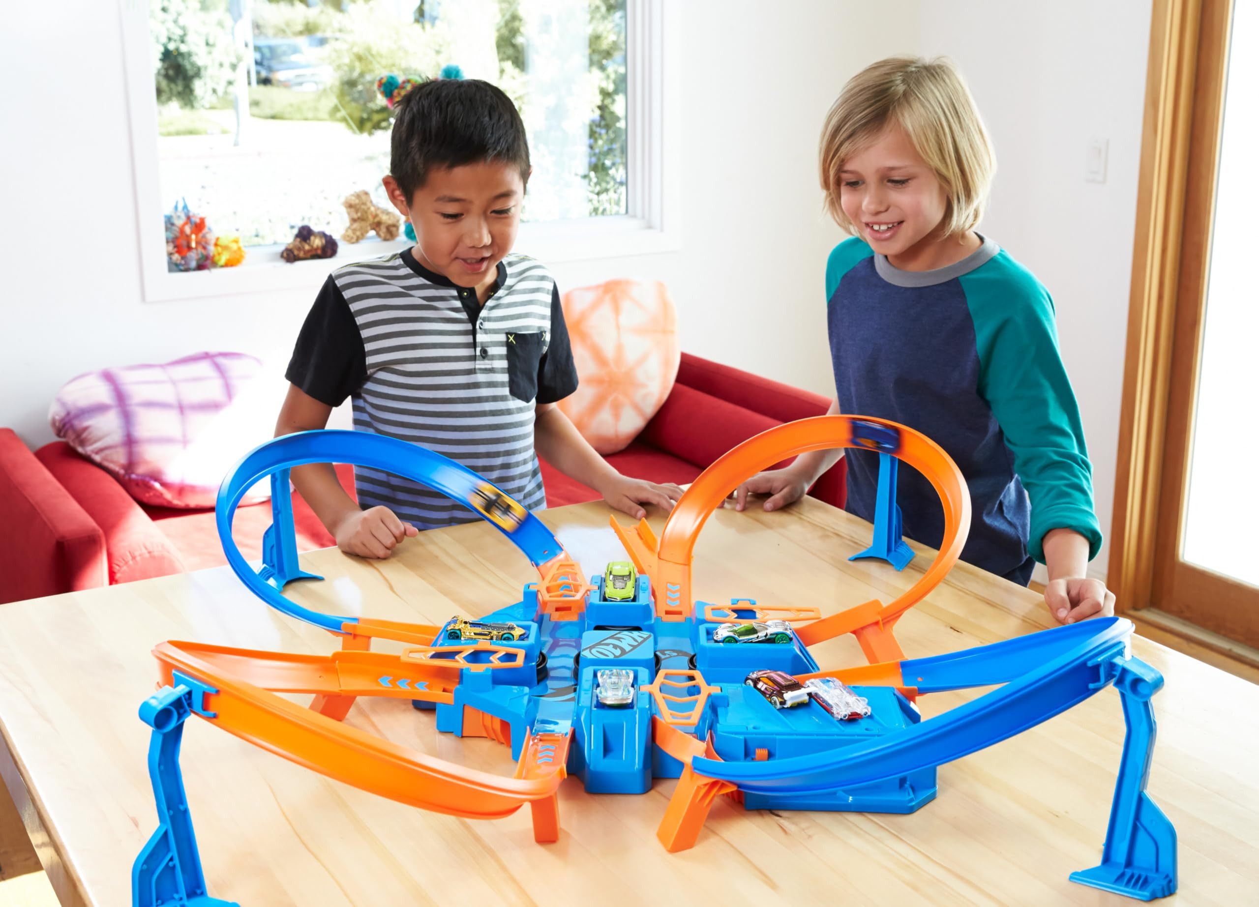 Hot Wheels Track Set with 1:64 Scale Toy Car, 4 Intersections for Crashing, Powered by a Motorize... | Amazon (US)