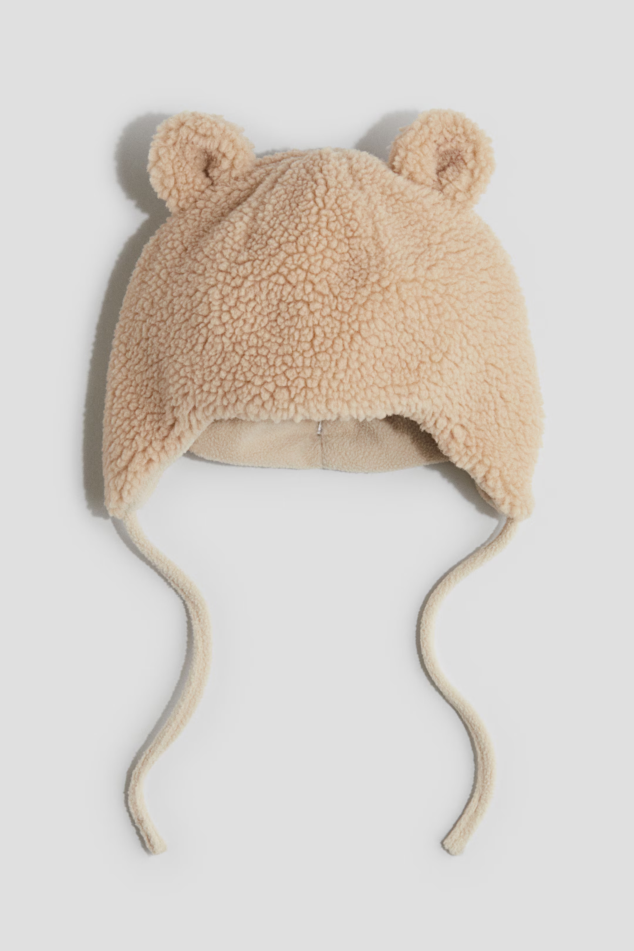 Fleece-lined earflap beanie | H&M (UK, MY, IN, SG, PH, TW, HK)