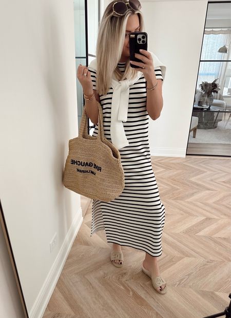 This SPANX dress is a must-have. Hangs so beautifully on & SUCH a nice material!
I ordered more colors! 
Dress: small
You can use code: LILLIEXSPANX for 10% off & free shipping on SPANX!

Travel style. Spring outfit. Dress. Work outfit. Spring dress. Stripe dress. SPANX. 
Designer sandals.

#LTKstyletip #LTKworkwear #LTKSeasonal