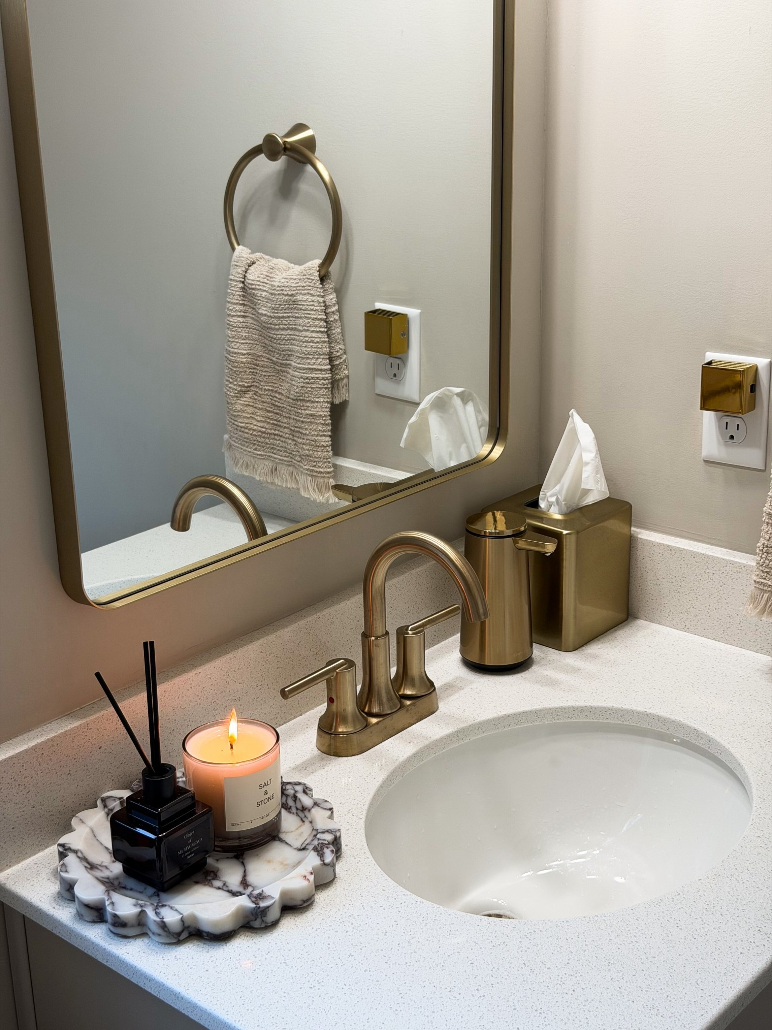 Guest bathroom restock ideas with chic brass accents, marble vanity tray, modern soap dispenser, tissue box cover, cozy candle decor, and elevated countertop styling. Perfect small bathroom refresh for a luxe hotel-inspired look. #LTKHome #BathroomDecor #GuestBathroom #BathroomStyling #VanityDecor #HomeFinds #AmazonHome 

#LTKBeauty #LTKHome