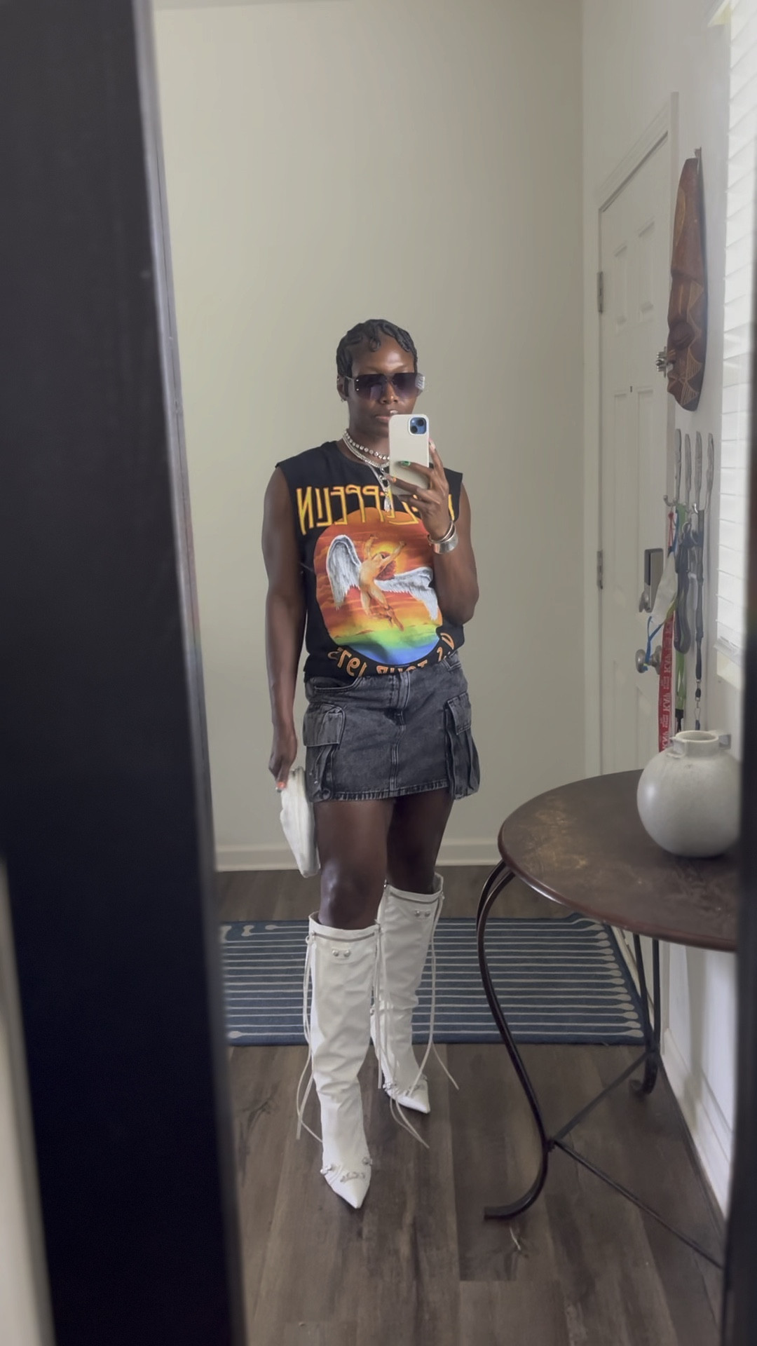 Fun outfit for a night out with friends or your partner. Date night. Edgy outfit. Graphic tee. Denim skirt.

#LTKStyleTip #LTKFindsUnder100