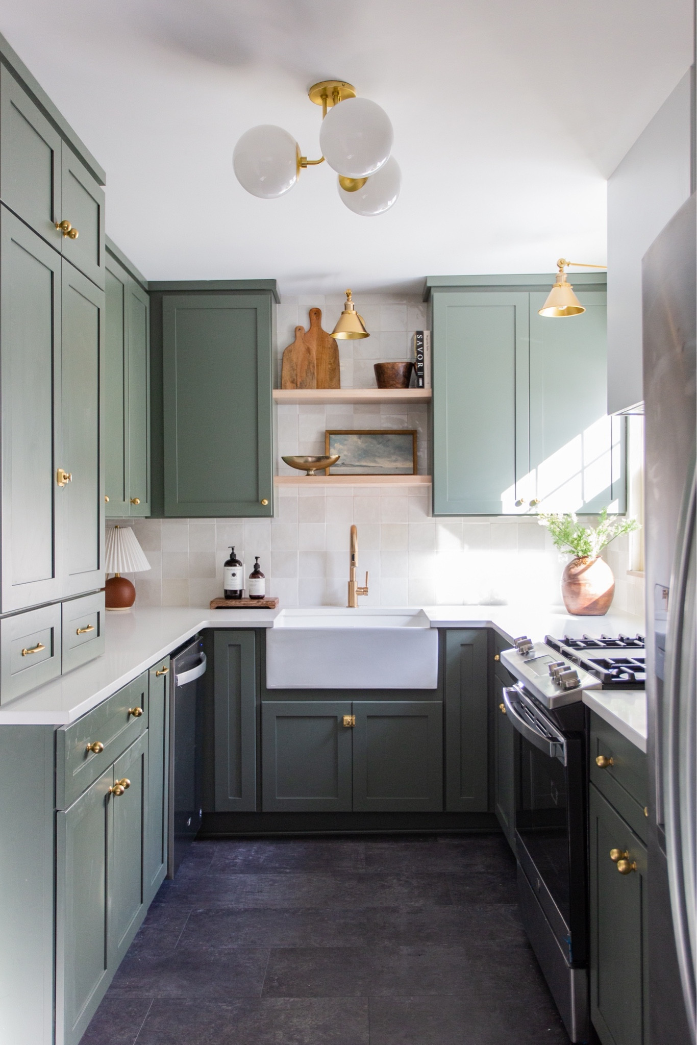 a little throwback to this fan favorite 😏 i’ve never been asked for a paint color more.

p.s. SAVE this post so you don’t forget the details:

👉🏼 paint is rosemary by @sherwinwilliams
👉🏼 hardware by @rejuvenation 
👉🏼 backsplash by @bedrosianstile 

#greenkitchen #kitcheninspiration #kitchendesign #kitchendecor #beautifulkitchen #kitchendetails #kitchenremodel 

#LTKHome
