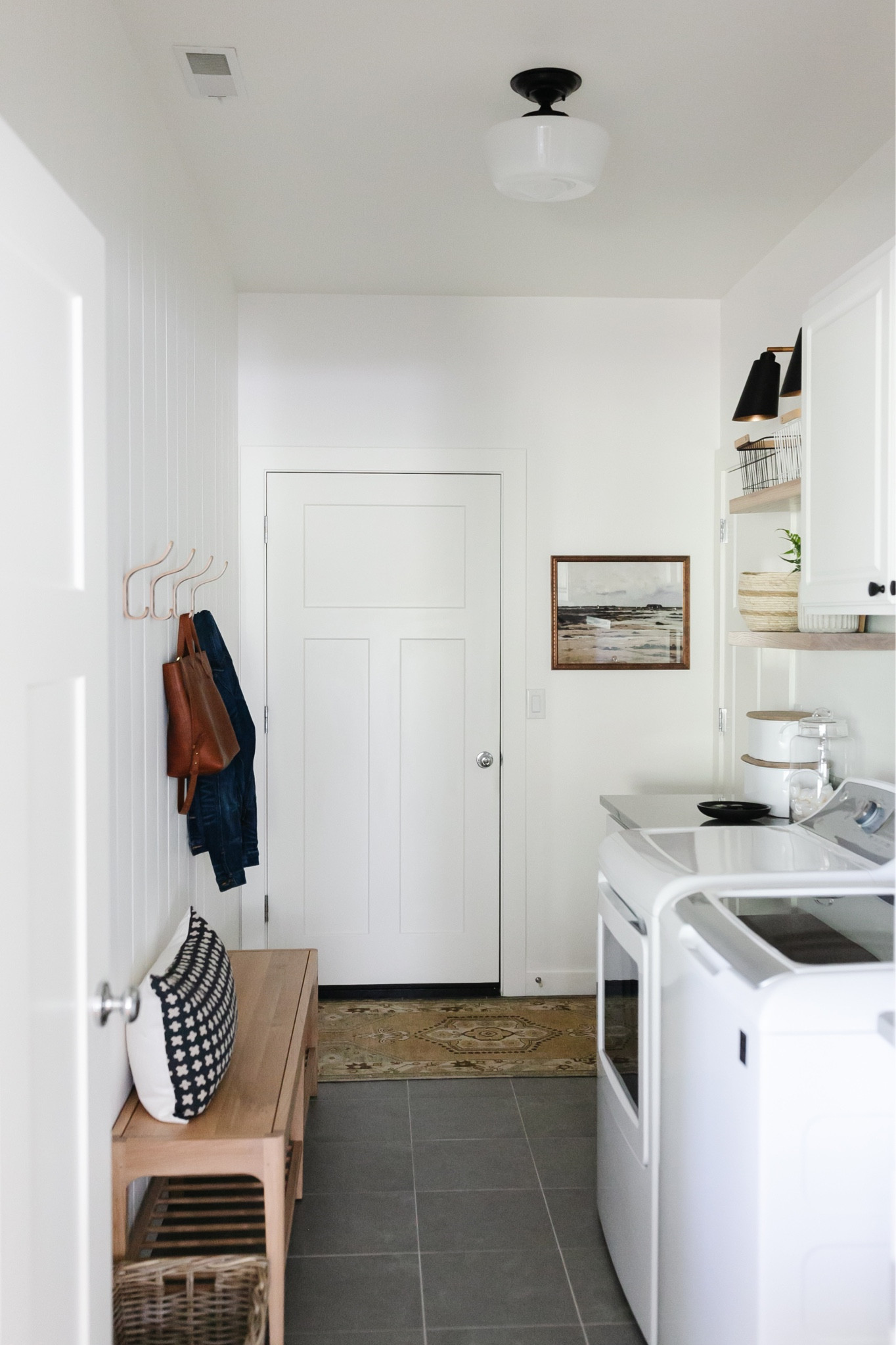 Laundry room decor, mudroom decor, Rejuvenation entry bench, wall hooks, storage, artwork, framed artwork, black sconces, farmhouse decor 

#LTKSeasonal #LTKhome #LTKstyletip