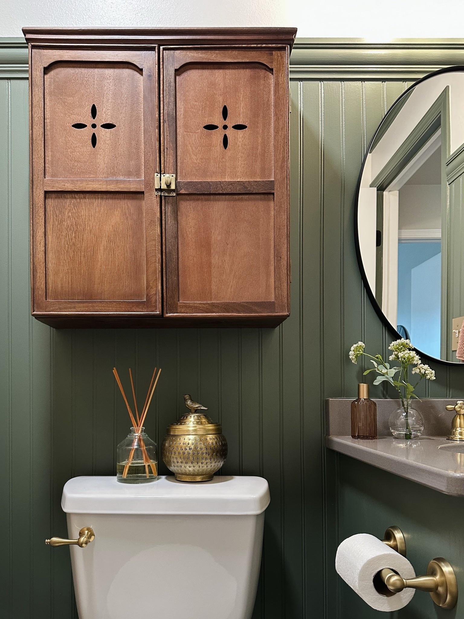Dark and moody green bathroom, brass bird canister, Amazon finds, magnolia finds, target finds, magnolia wooden bathroom cabinet, reed diffuser, Kingston brass

#LTKHome