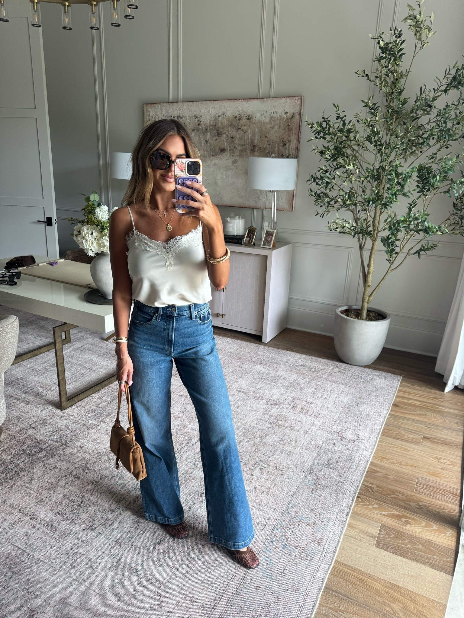 Love that you can style this cami so many different ways! Wearing size small top and 27 bottoms!!

#LTKootd #LTKdayinmylife #LTKSaleAlert