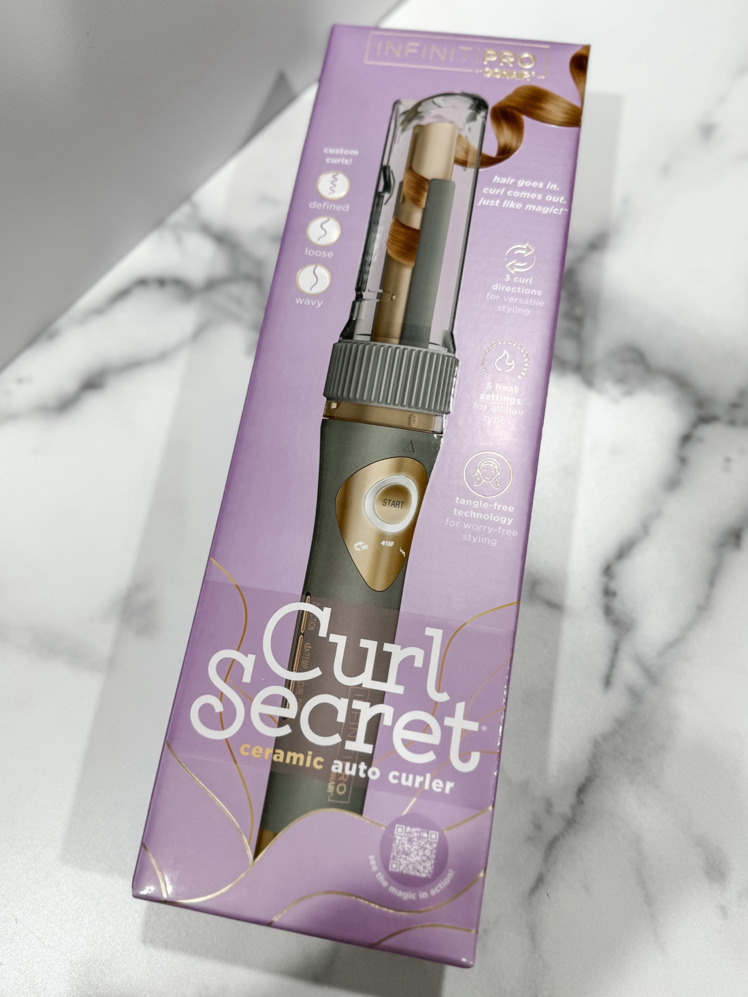 Curl Secret is the new way to create curls that won't quit. Select a temperature, a curl type, and a curl direction, then place a section of hair into the slot. Push START and watch as hair gently wraps around the barrel. In moments, release hair from the styler to reveal the perfect curl! Choose from 3 preset curl types (defined, loose, or wavy), 5 heat settings for all hair types and 3 curl directions.

#LTKGiftGuide #LTKSeasonal #LTKCyberWeek