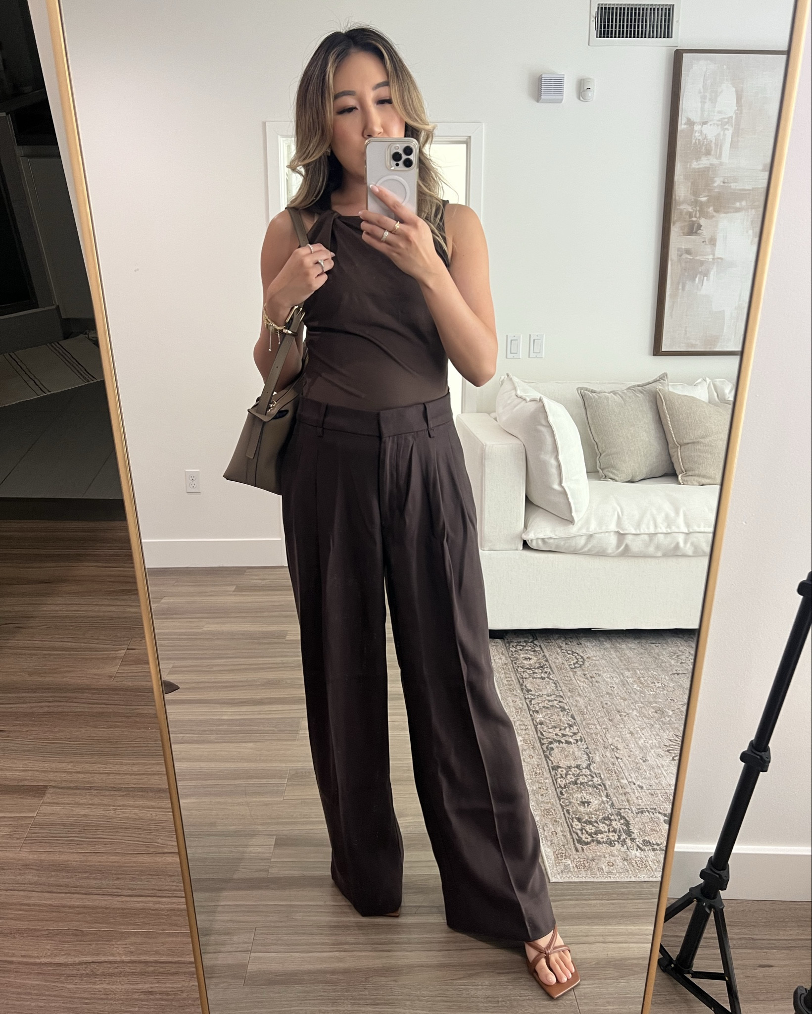 A bit of an autumn workwear capsule wardrobe - the chocolate brown trousers are so versatile and go with a variety of tops! I personally love the sleeveless twist tie top, white tie blouse, and the burgundy long sleeve top. The long sleeve is even prettier in person due to the draping! Tie twist top is M, but all other tops are S, and trousers are 6. 

#LTKFindsUnder50 #LTKSeasonal #LTKWorkwear