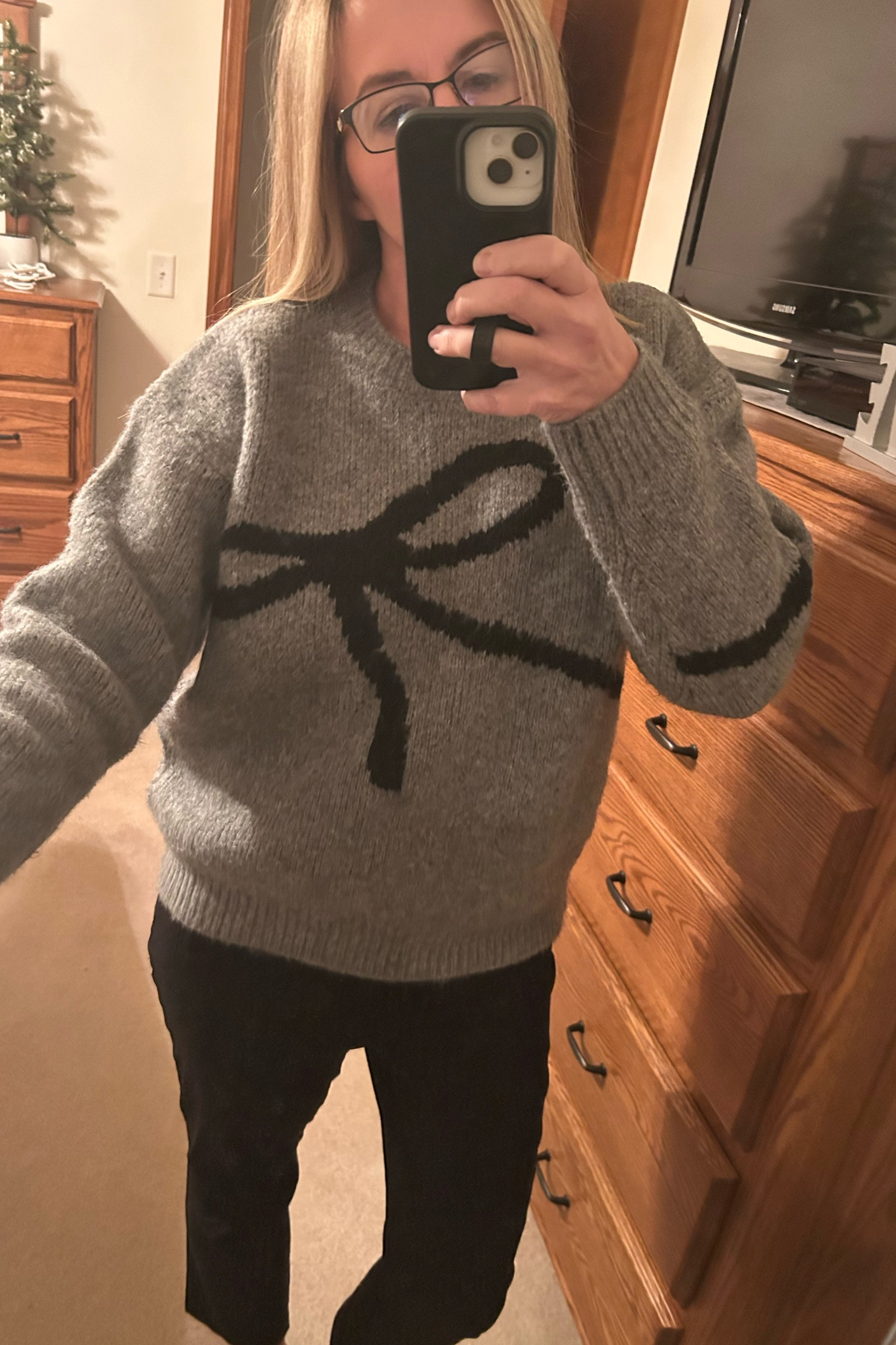 Winter Workwear! Stay cozy with this adorable bow sweater pair with black pants and black booties. #teacherootd #bow #chunkysweater #winterootd #teacher 

#LTKWorkwear #LTKStyleTip