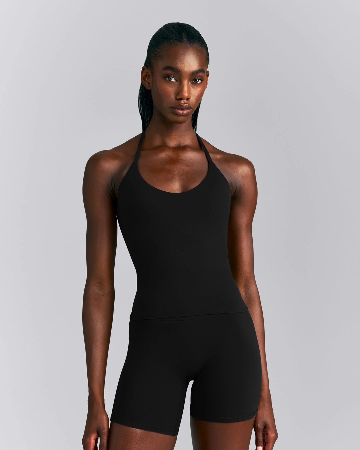 SoftMotion\u2122 Strappy Halter Neck Vest with Built in Bra Shelf New Branding 
 Black | Oner Active (UK / US)