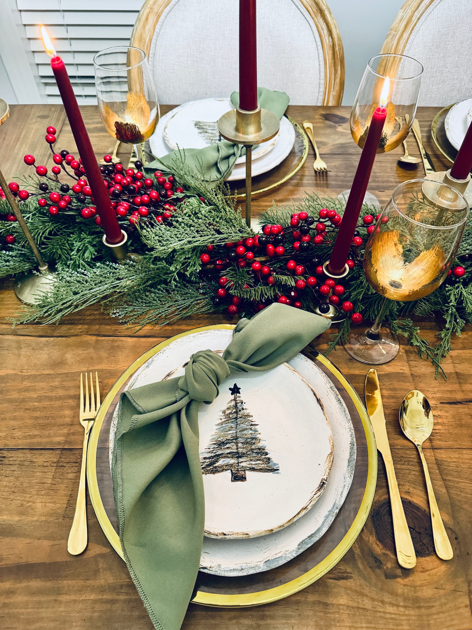 Class Christmas tablescape. Table decor with classic red and green. Garland table runner 

#LTKHoliday #LTKSeasonal #LTKHome
