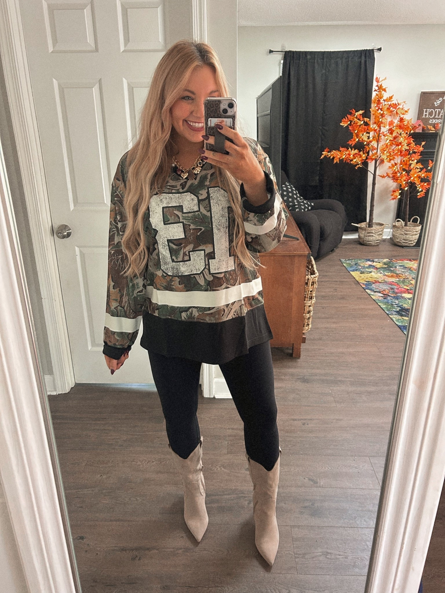 Walmart head to toe! 😍 Grabbed this camo hockey jersey from the men’s section and I love it!!! Sized up to a large for an oversized look! Paired it with $5 leggings and my fav Wally World cowgirl boots! 👏🏼 

#LTKStyleTip #LTKFindsUnder50 #LTKMidsize