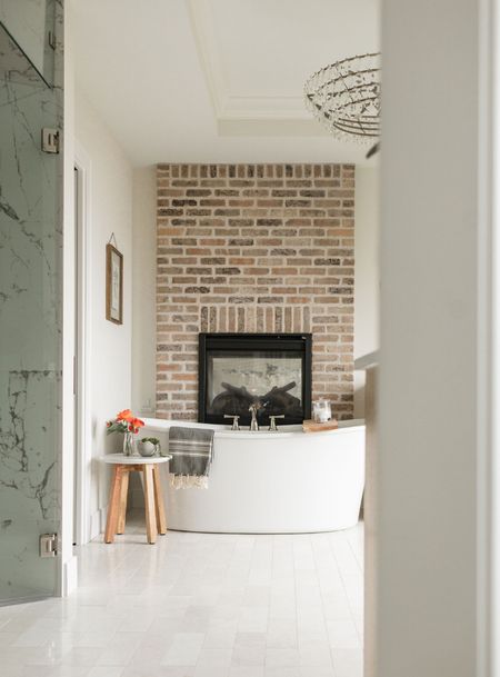 We included a vairety of spa-like features at #thelakeloft to create our dream bathroom oasis. My favorite way to unwind after a long day is in this tub, with the fireplace lit! 🔥 #almahomes

#LTKunder50 #LTKhome #LTKunder100