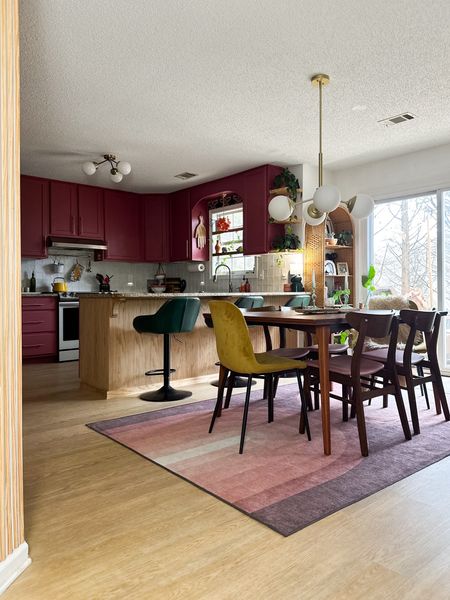 Moody and Colorful open concept dining room and kitchen. 

#LTKhome #LTKfamily #LTKSpringSale