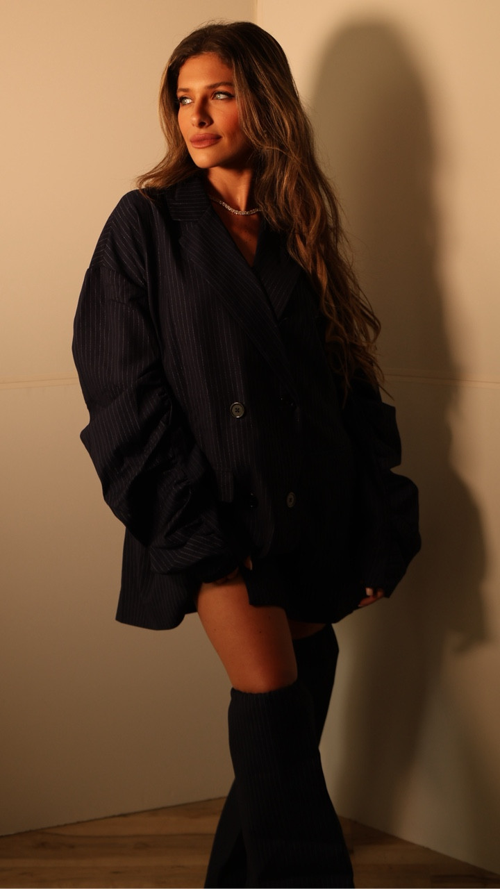 Boss babe! The AKIRA Label Business Meeting Chic Blazer Dress And Leg Warmer Set is crafted from a structured, sleek blazer base fabrication and features a tasteful pinstripe pattern throughout, a notch lapel collar, long ruched sleeves, a mock chest pocket, mock flap waist pockets, a sleek inner lining, and a faux leather corset overlay on the back with a lace-up panel. The leg warmers boast a coordinating pinstripe pattern, a sleek inner lining, a bungee cord drawstring closure at the top hem for a custom fit, and a wide leg silhouette. Pair together to show who’s boss at your next office meeting.

#LTKCon #LTKPetite #LTKWorkwear