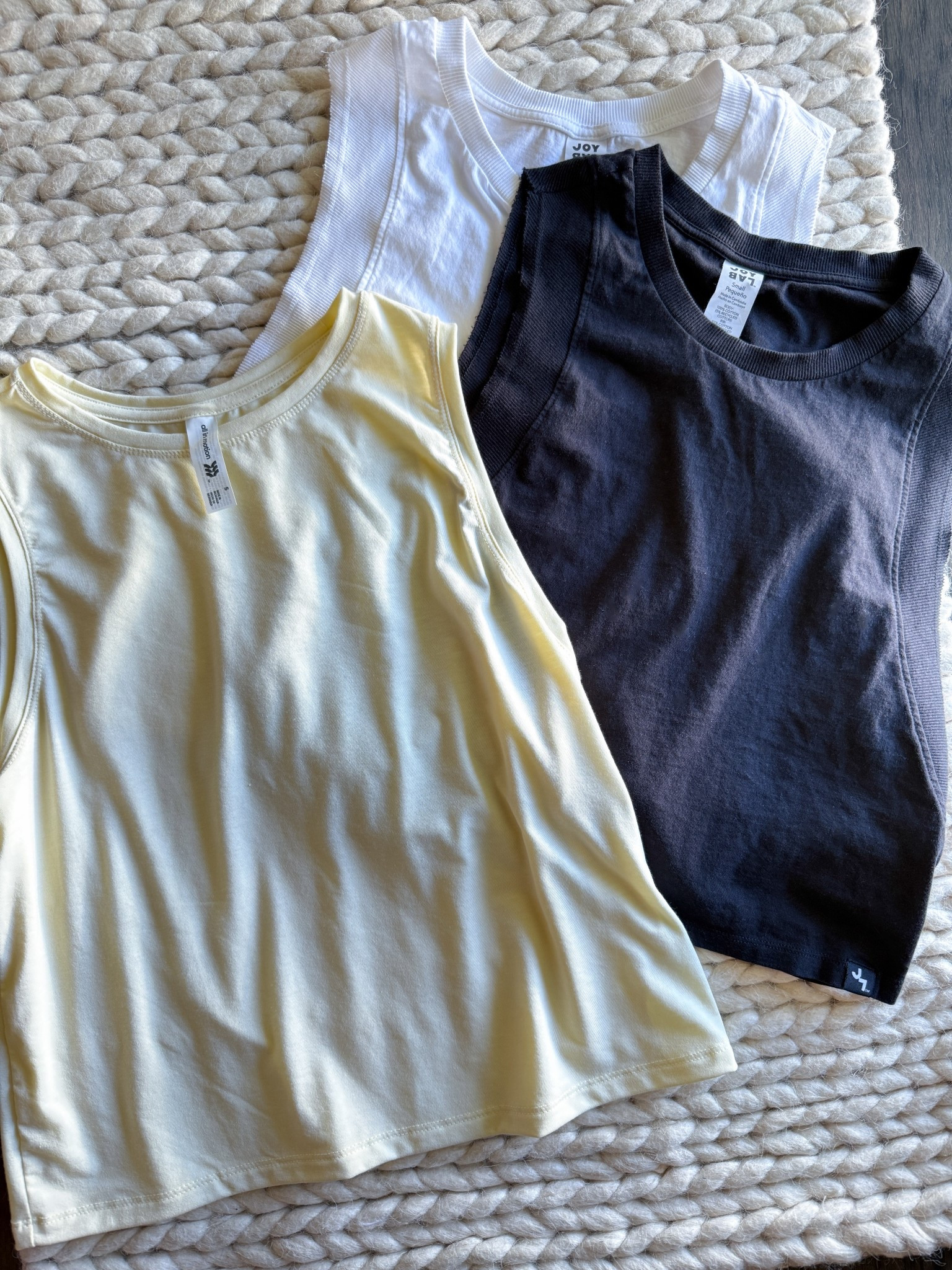 These are hands-down the most underrated basic tanks I own. They’re soft, thick enough to wear alone, + the cut is so flattering. Somehow casual & polished at the same time. I reach for these on repeat with leggings, joggers, & shorts. I wear a small (see tags for reference) & would absolutely grab every color! The black, white, & butter yellow are perfect summer staples.

#LTKStyleTip #LTKActive #LTKSummerEdit