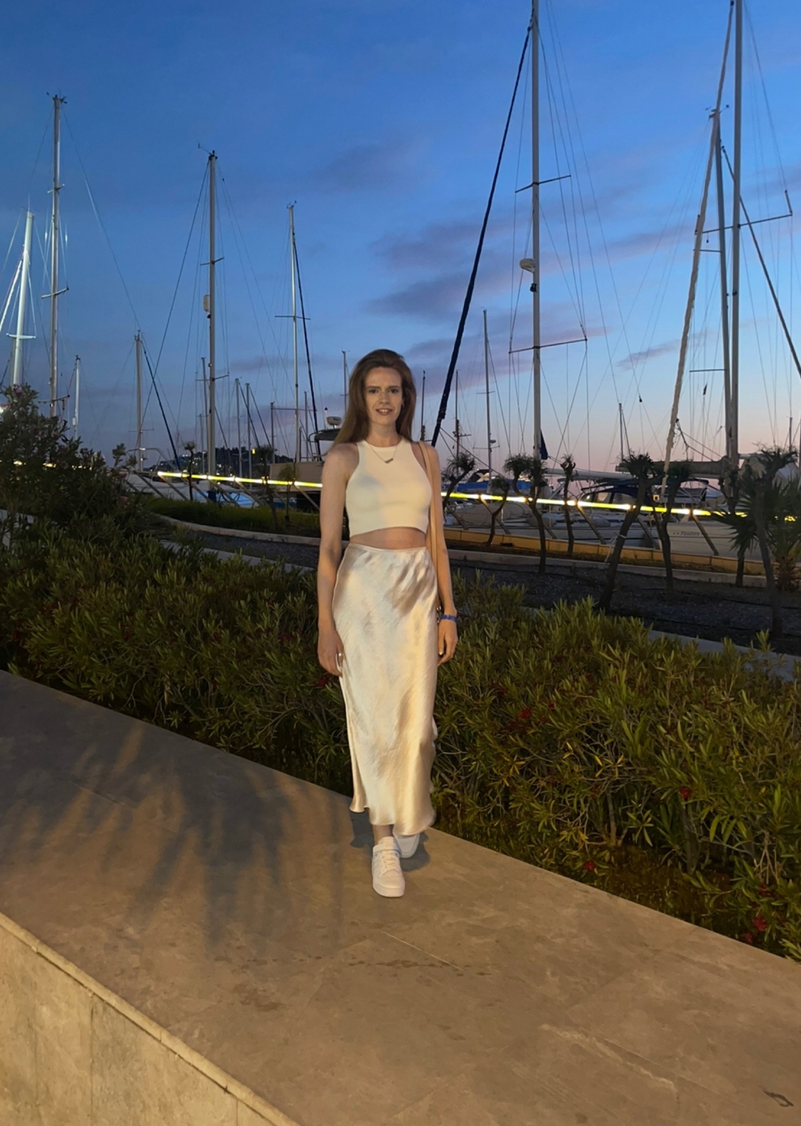 What to wear for a chic but casual night out in summer? Long skirts are every wear this season and they are perfect for a day to night outfit. #longskirt #croptop #creamsatinskirt

#LTKSeasonal #LTKeurope #LTKunder100