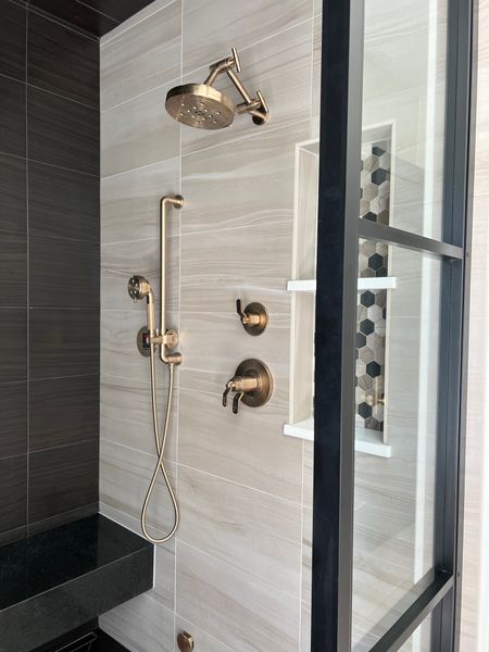 Primary bathroom shower plumbing. These were definitely a splurge. We love Brizo products so much. The one thing is the shower head. It could be better! I love the hand sprayer though. 

#LTKstyletip #LTKfamily #LTKhome