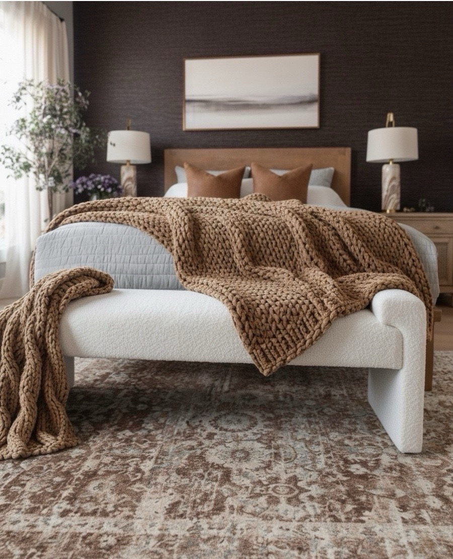 ✨ Shop the look
Warm oak bed frame
Soft gray and white layered bedding
Caramel throw pillows
Chunky knit throw
Ivory upholstered bench
Distressed warm brown patterned rug
Woven natural oak nightstands
Marble base table lamps
Large leafy faux tree
Exposed oak ceiling beams
Round glass pendant


#LTKSaleAlert #LTKHome