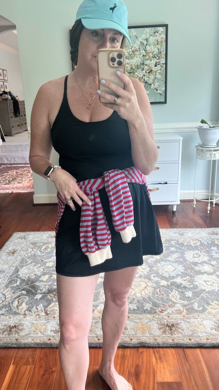 Easy hot summer day mom outfit. All in athletic dress. Built in bra and shorts. Size medium. Could have sized down. Pair with the perfect sneakers. I wore to a festival, amusement park, and baseball game. Great option for busy ladies  

#LTKMidsize #LTKOver40 #LTKActive