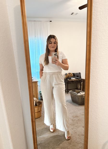 New favorite pants! I got the black ones too. My shoes also come in a fun woven/rattan-looking style. I heavily debated which color to go with, they are both so cute!!! #summerstyle #midsize #linenpants #wedges 