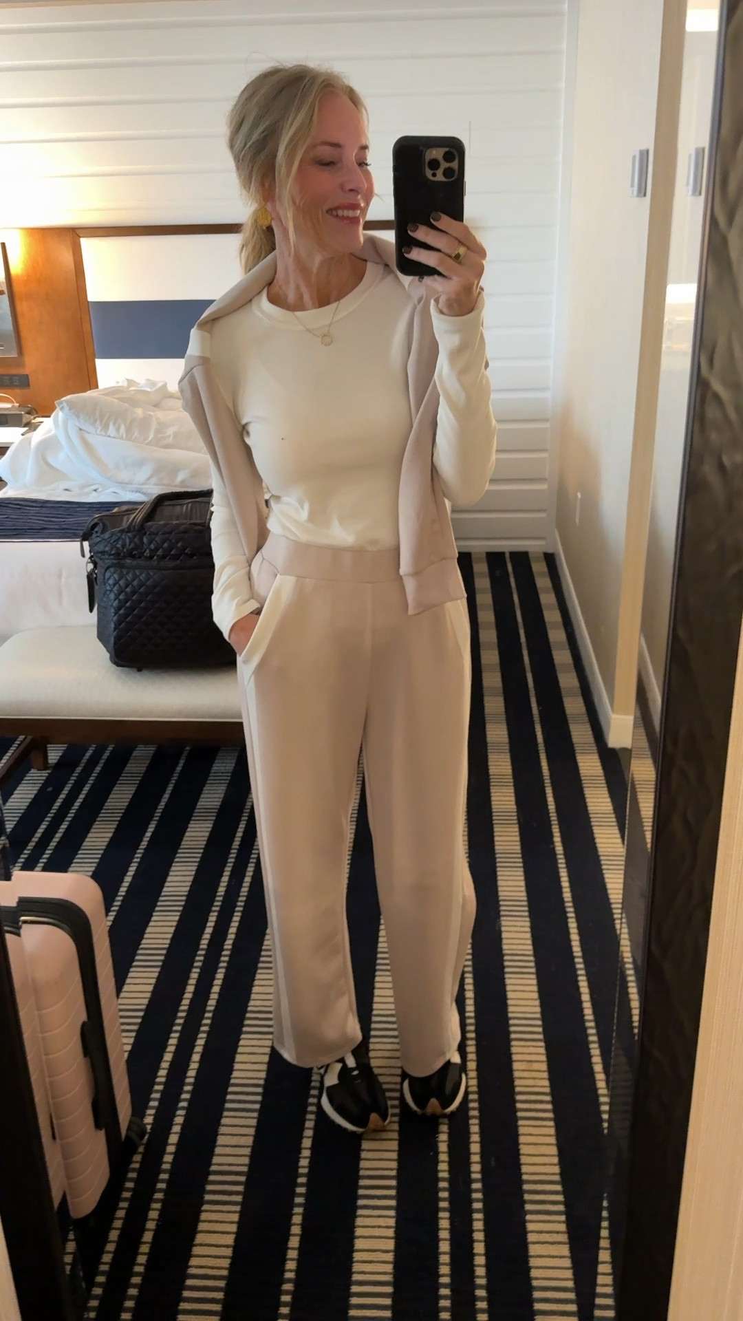 This looks and feels designer but is under $40. Wearing a medium. Runs true to size

#LTKTravel #LTKOver40 #LTKootd
