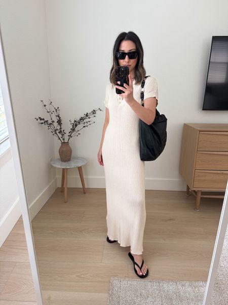 Varley Aria knit dress. This one is amazing. I love the cream color, very versatile. This is the length before a wash and dry. More mid calf after wash and dry, which I love. Lays on body so well. Flattering and so soft. 

Varley dress xs
Anine Bing bag small
Madewell sandals 5
YSL sunglasses  
