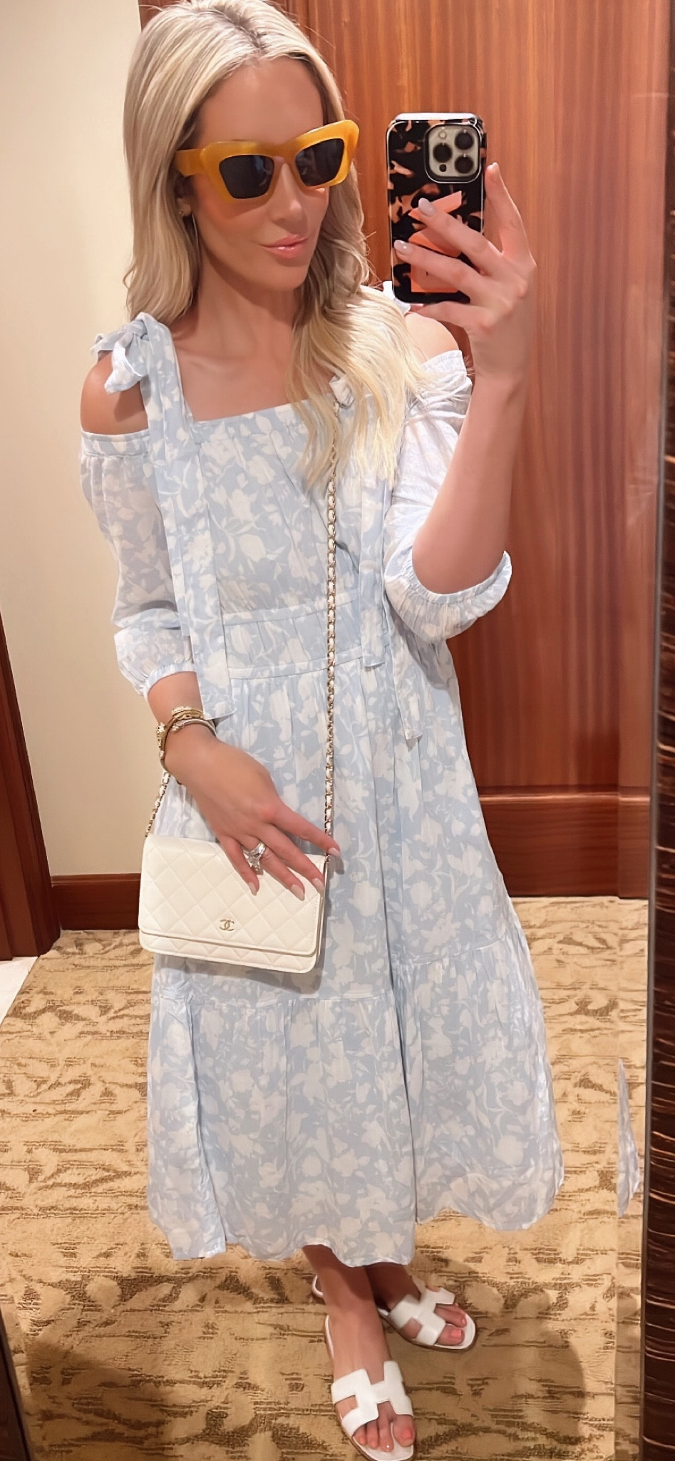 Obsessed with this blue floral dress. So affordable and looks designer. Perfect for Easter. Get your normal size, if between sizes, you can size down. 

#LTKunder100 #LTKstyletip #LTKunder50