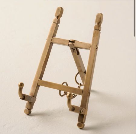 Brass easel 

#LTKhome #LTKsalealert #LTKfindsunder50