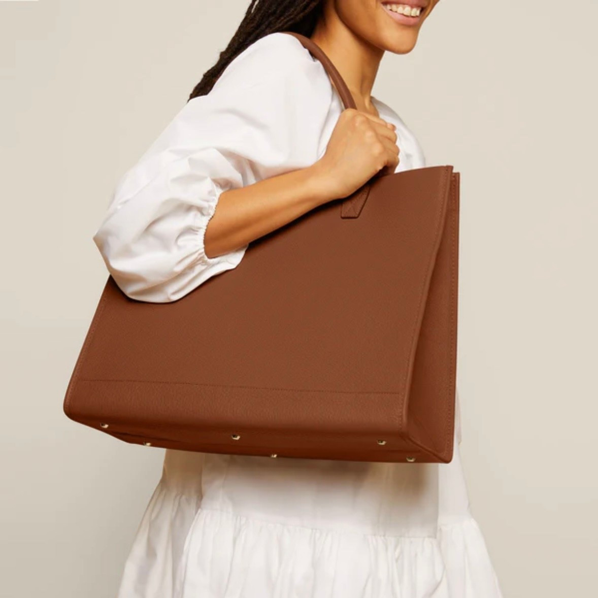 I needed a new work tote bag. My old designer one now flops over. This one has great reviews! Looks chic and sturdy enough to put my paint decks, fabric swatches in it which can weigh a bag down. 

#LTKWorkwear #LTKootd #LTKdayinmylife