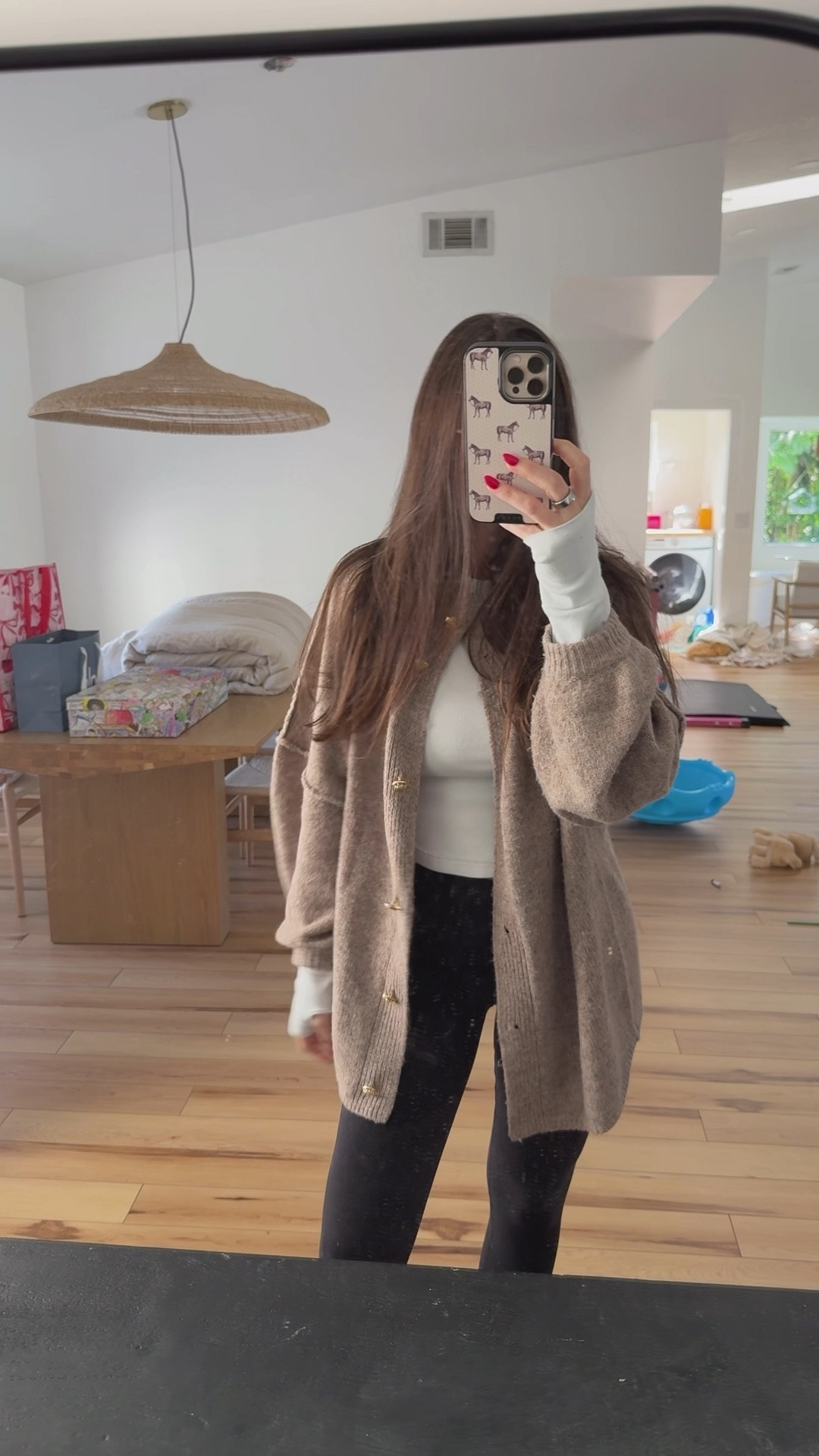 buying this cardigan in ever color! It is so good! So soft and comfortable! This is the color Camel in size Small! #cardigan #sweater #coldweatheroutfit #loungewear

#LTKWatchNow #LTKFindsUnder50 #LTKStyleTip