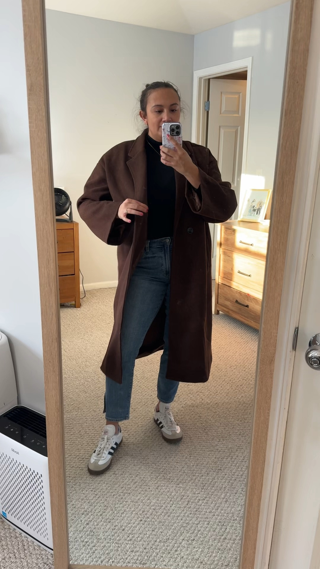 An oversized wool coat in espresso/dark brown. There are other colors like khaki, dark green (pickle), black or gray. An amazing option that looks like higher end wool coats. I got an XL for a looser fit over my breastfeeding chest🙃.

#LTKStyleTip #LTKFindsUnder100 #LTKMidsize