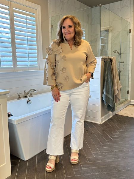 My beautiful scuba top is by Caryn Lawn. A really unique designer outdoor Dallas that makes one size fits many clothing. I’m a size L/XL  12/14 and this scuba top fits amazing. My friends tried it and they’re small and mediums and it looks great. This is beautiful. So unique. 

These white jeans are a kick crop and a great easy style. Not wide leg. Not skinny. I wearing a 32/14. I always go my larger size in white  

#LTKmidsize #LTKover40