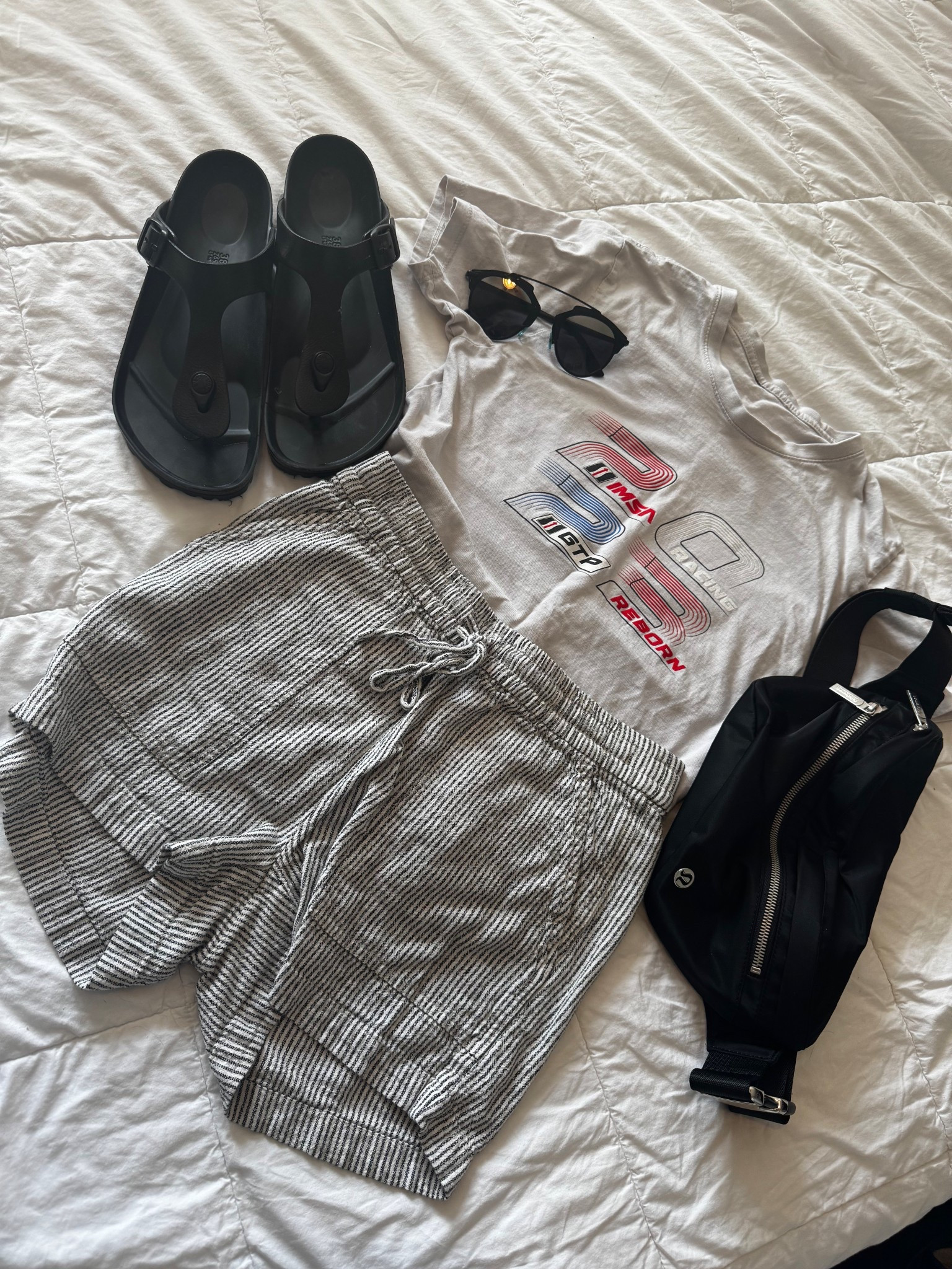 Outfit idea number 2 for the racetrack. I love a good graphic tee and this one I picked up in 2023 at IMSA. 

#LTKPetite #LTKFindsUnder100 #LTKSummerEdit