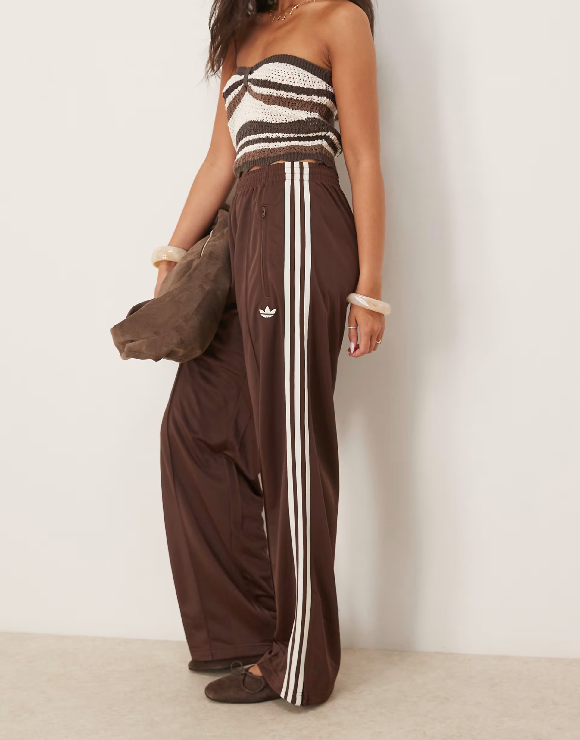 adidas Originals Firebird Loose track pants in brown | ASOS (Global)