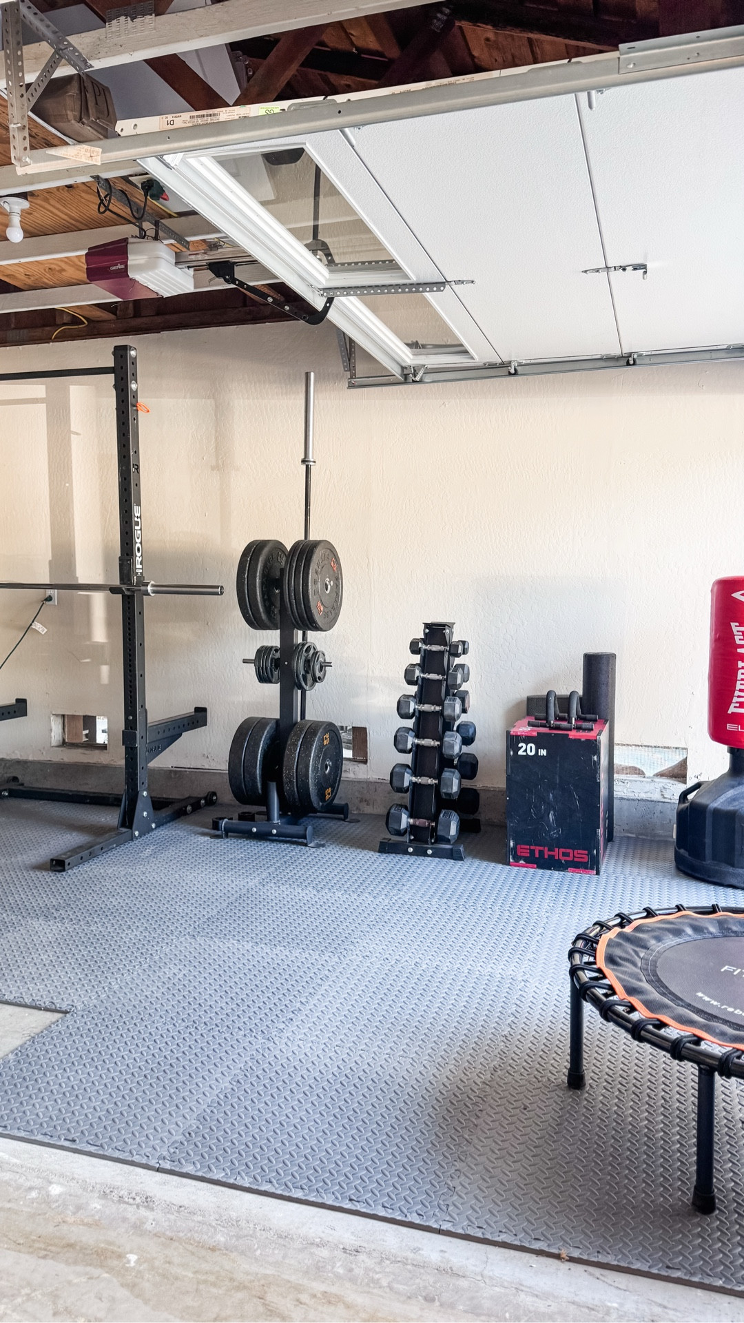 Garage gym floor tiles … night and day how this corner of the garage transformed! No excuses this winter to get or stay in shape! 

#LTKHome #LTKActive #LTKSeasonal