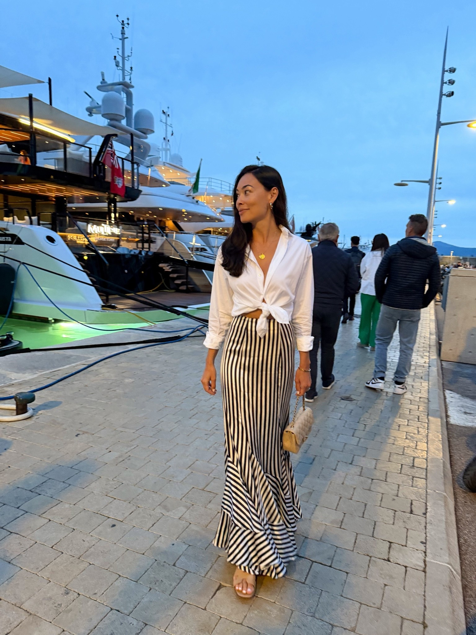 St. Tropez 🤍 stripe silk skirt, white button down, summer outfit.

#LTKootd #LTKTravel #LTKSeasonal