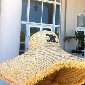 CELINE WIDE-BRIMMED TRIOMPHE HAT IN RAFFIA
NATURAL | Poshmark