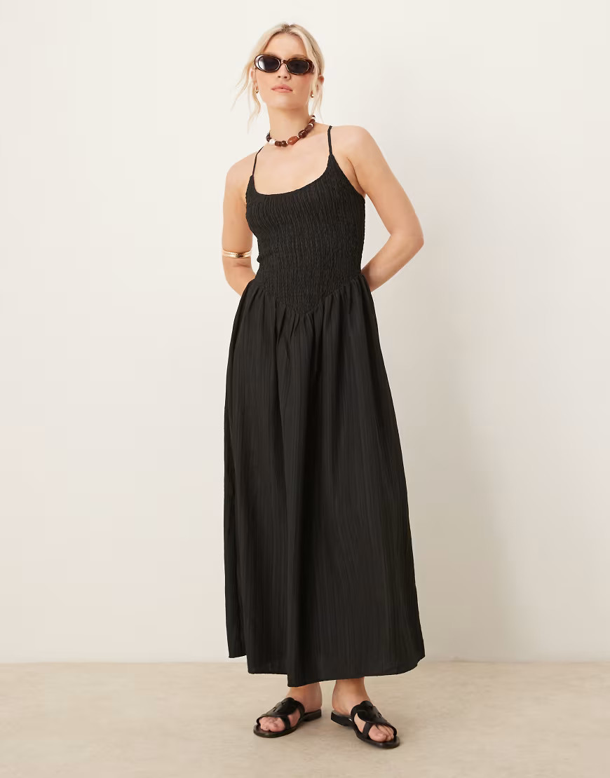 ASOS DESIGN scoop neck crinkle maxi dress with cross back in black | ASOS (Global)
