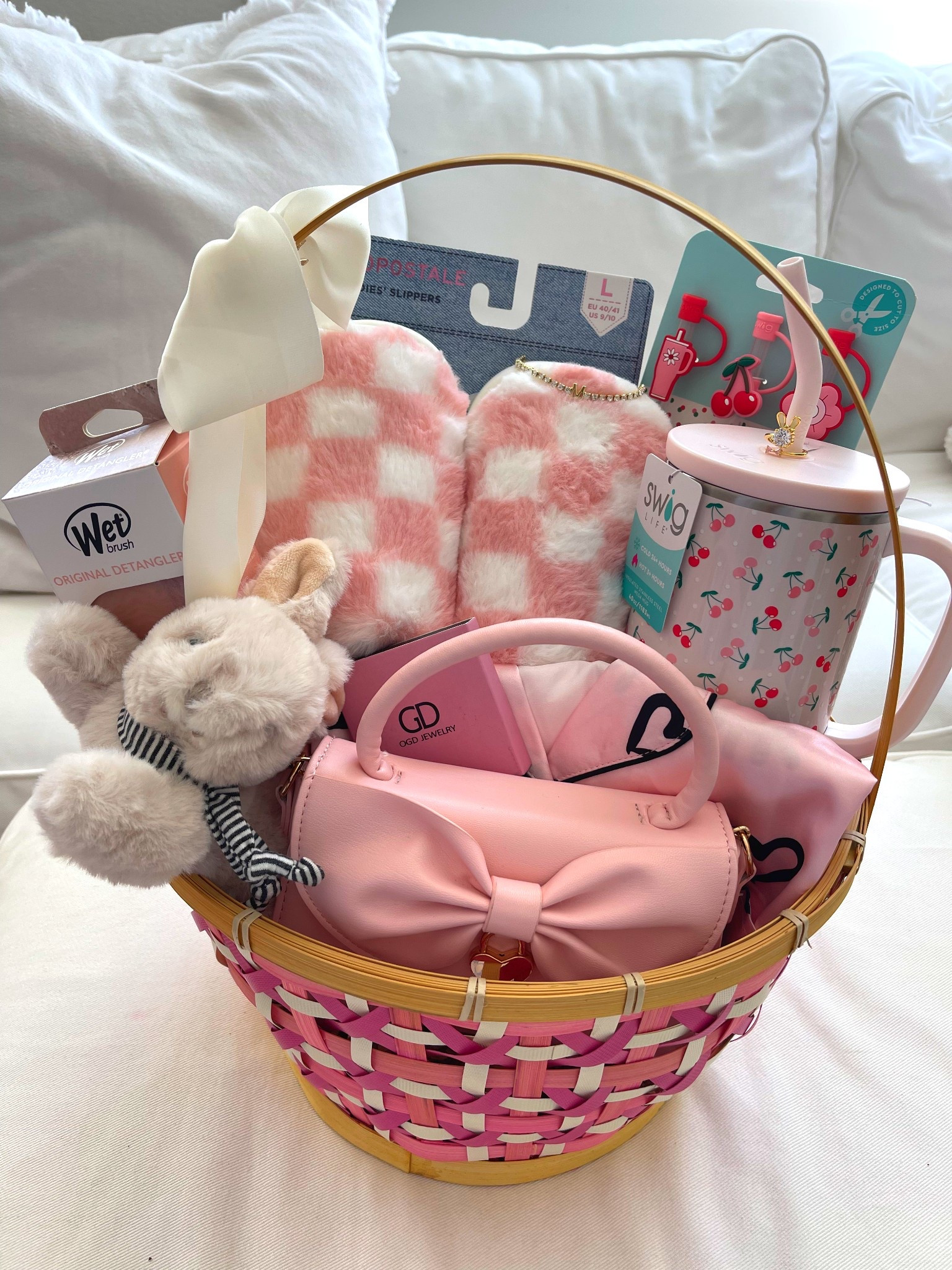 Easter Basket 🐰💕

Slippers, tumbler, tumbler straws, pajamas, handbag, stuffed toy bunny, hair brush, ring, bracelet and necklaces. Gifts for girl preteens, girl gifts, gifts for her.

#LTKKids #LTKGiftGuide #LTKFindsUnder100