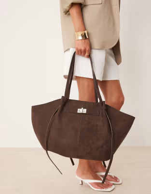 Gina Tricot faux suede medium tote bag with strap and clutch detail in dark brown | ASOS (Global)