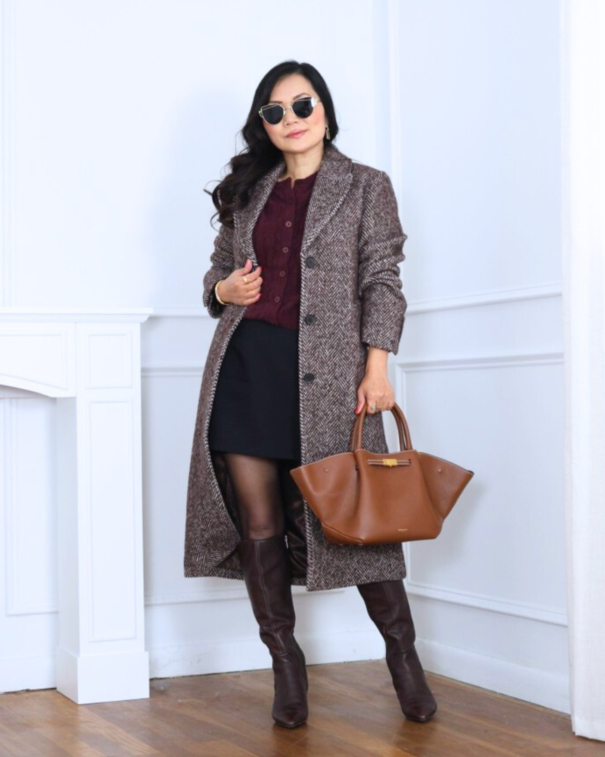 A wool-blend coat and mini skort from Abercrombie set the perfect chic foundation, and the pointelle cardigan from J.Crew adds that soft, feminine touch. Finished with sleek Naturalizer knee-high boots, this outfit feels polished, cozy, and ready for anything the day brings. I’m 5’2, wearing size XS.

#LTKOver40 #LTKPetite #LTKootd