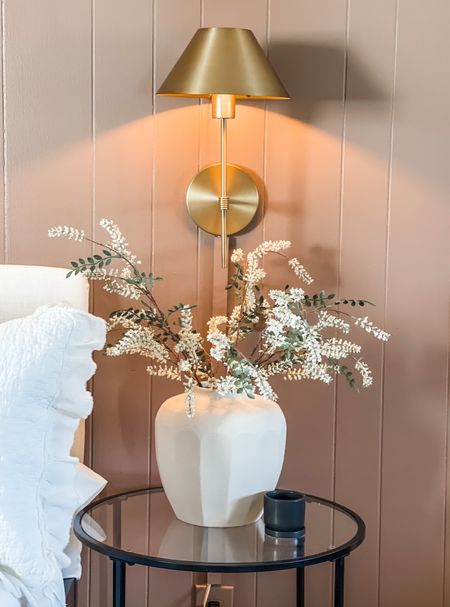 Love the way my dimmable plug in wall sconce lights up my guest bedroom wall! Tip: paint your cord covers to match your wall color! 

#LTKhome #LTKstyletip