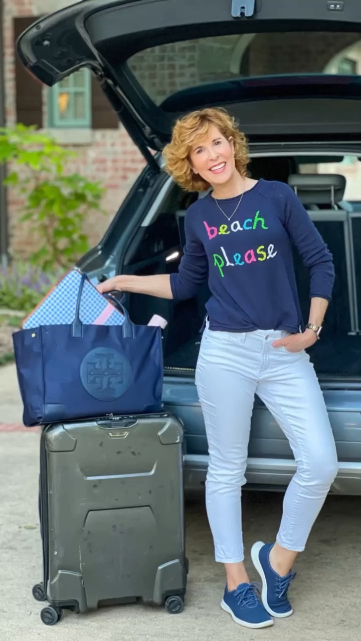 This sweater is perfect for a beach lover like me! (It would make a great gift!) I paired it with white jeans and my navy blue washable sneakers that are sooo comfy! My faux sapphire and diamond earrings coordinate perfectly, and I added some gold chairs for fun. 

I’m carrying my fave navy blue tote and using Briggs & Riley luggage. It has a lifetime warranty! 🙌🏻

Travel look, travel outfit, beach outfit, white jeans, blue sweater, loose knit sweater, navy blue sneakers, luggage, tote, custom computer case

#LTKSeasonal #LTKtravel #LTKshoecrush