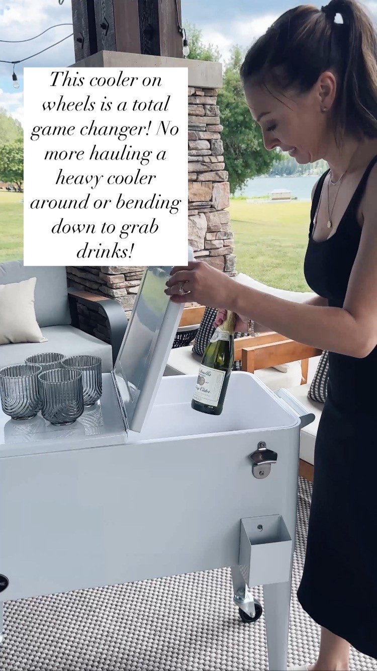 This cooler on wheels is a total game changer! No more hauling a heavy cooler around or having to bend down to grab a drink. Not to mention how much nicer it looks and the fact that it has a bottle opener with a catch for the tops! 

#LTKSaleAlert #LTKParties #LTKHome