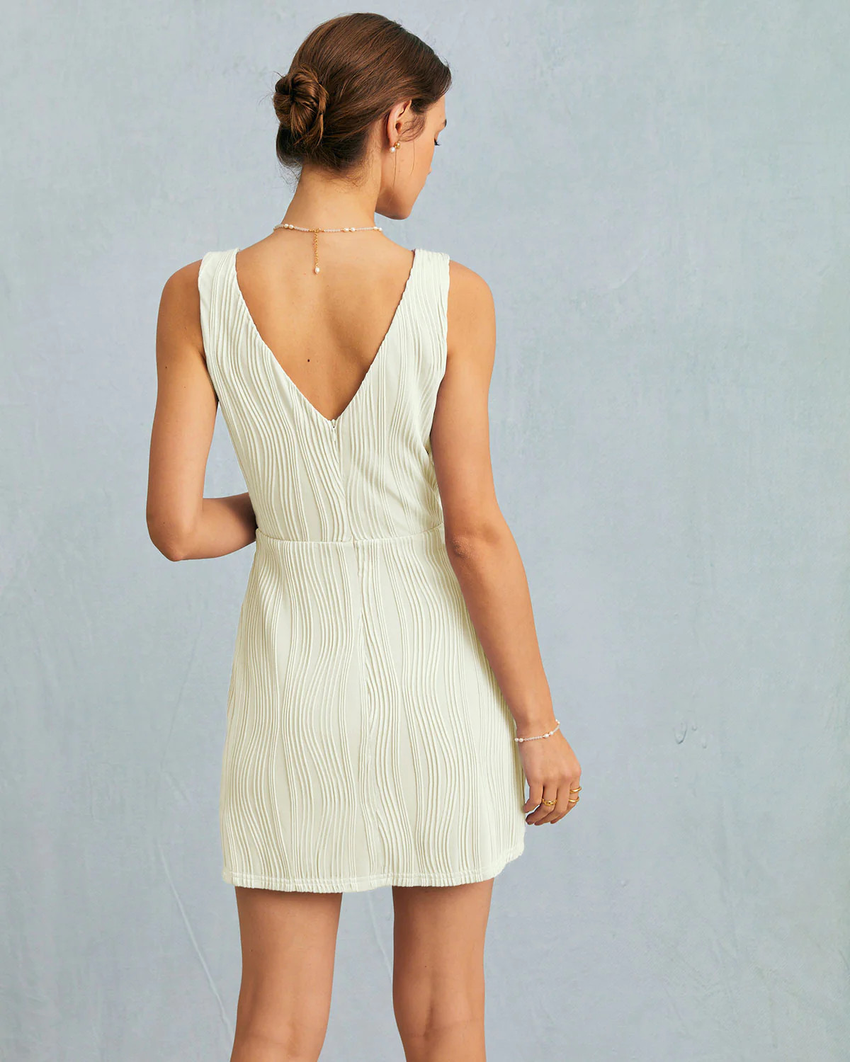 The Solid Water Ripple Textured Sleeveless Mini Dress | rihoas.com